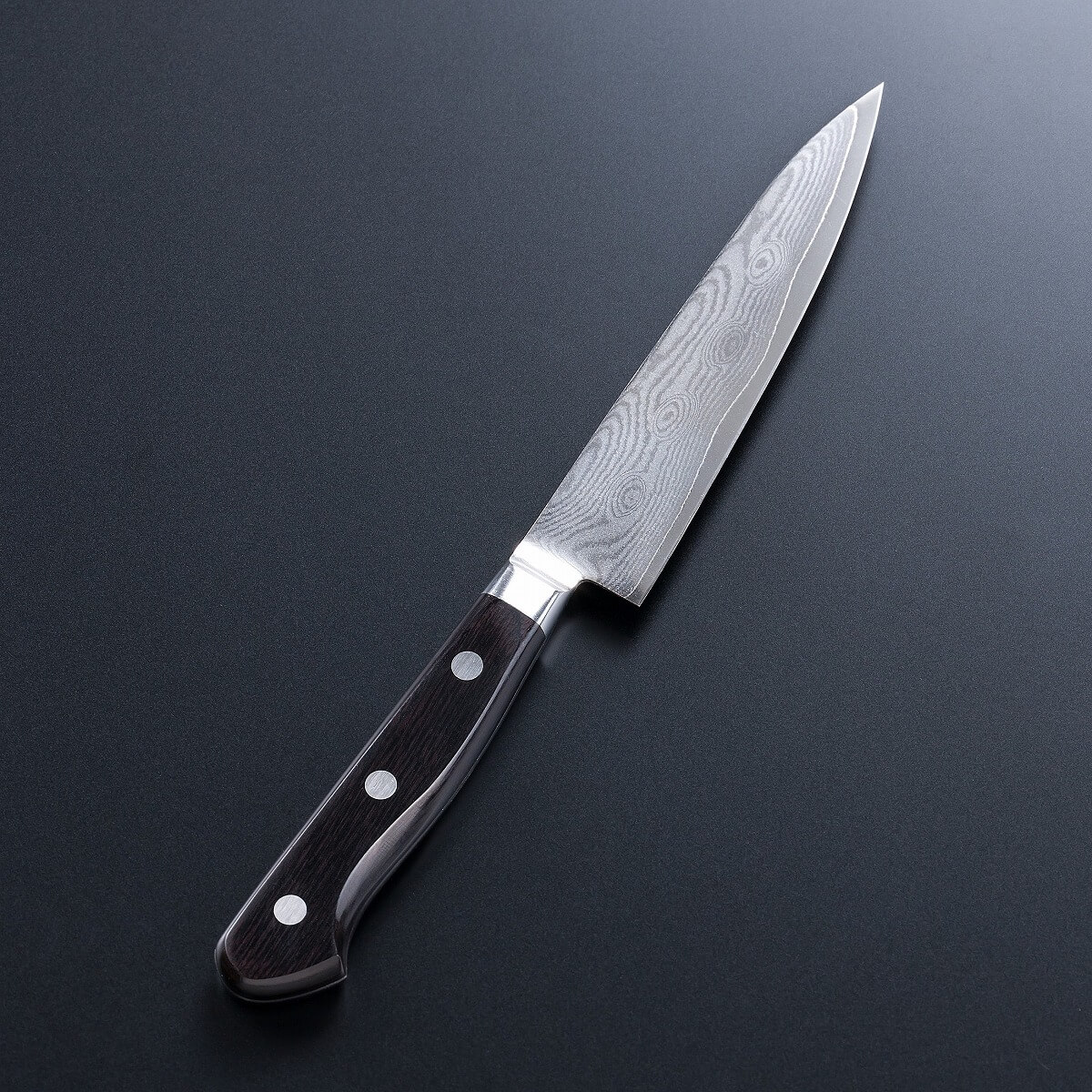 ペティナイフ 両刃 120mm V金10号 ステンレス ダマスカス模様 共口金付き 黒合板柄